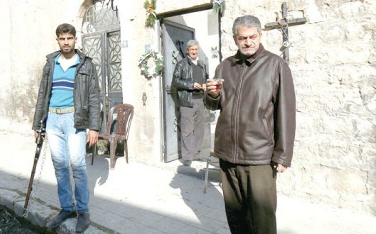 المعتقلون السوريون المسيحيون بين استبداد القوات الحكومية وإرهاب المتطرفين