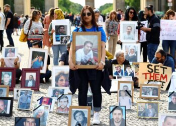 Syrians in Berlin seek release of loved ones after presidential amnesty