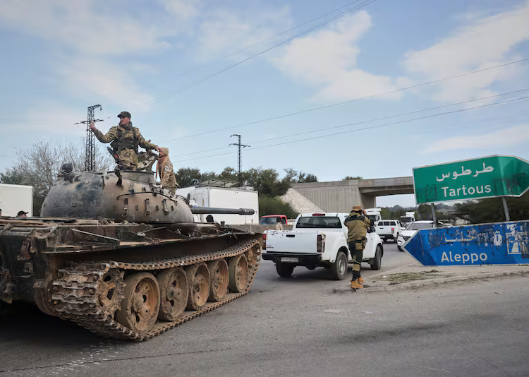 More than 130 killed as Syrian government forces and pro-Assad militias clash